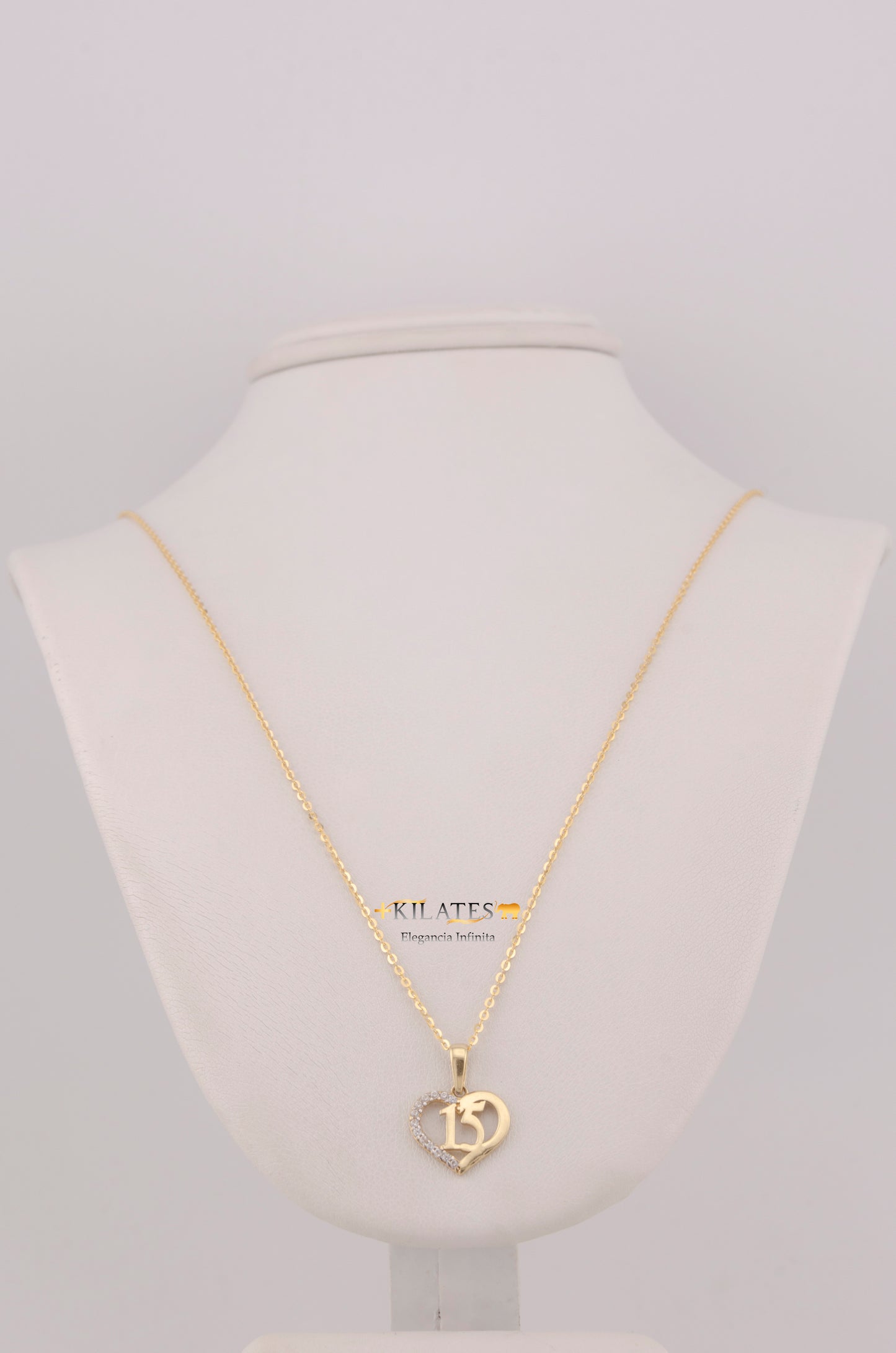 " CADENA PARA DAMA DE 50CM ESTILO CUADRADA SOLIDA CON DIJE DE 15 AÑOS. ORO 10K #775-3780"