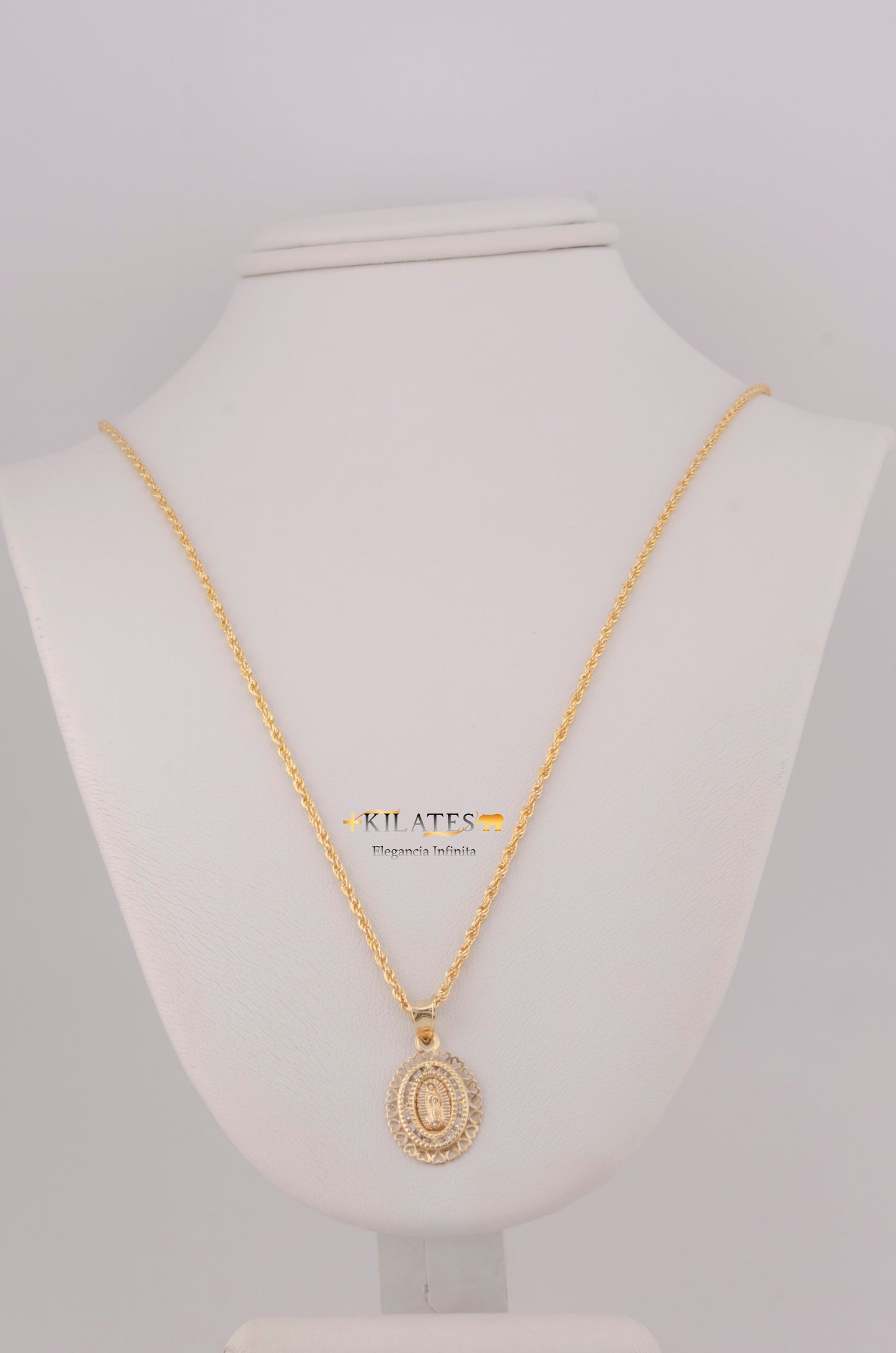 "SET DE CADENA ESTILO LAZO DE 50CM PARA DAMA CON DIJE Y ARETES DE CORAZON CON ZIRCONIA BLANCA. ORO 10K #775-3799"