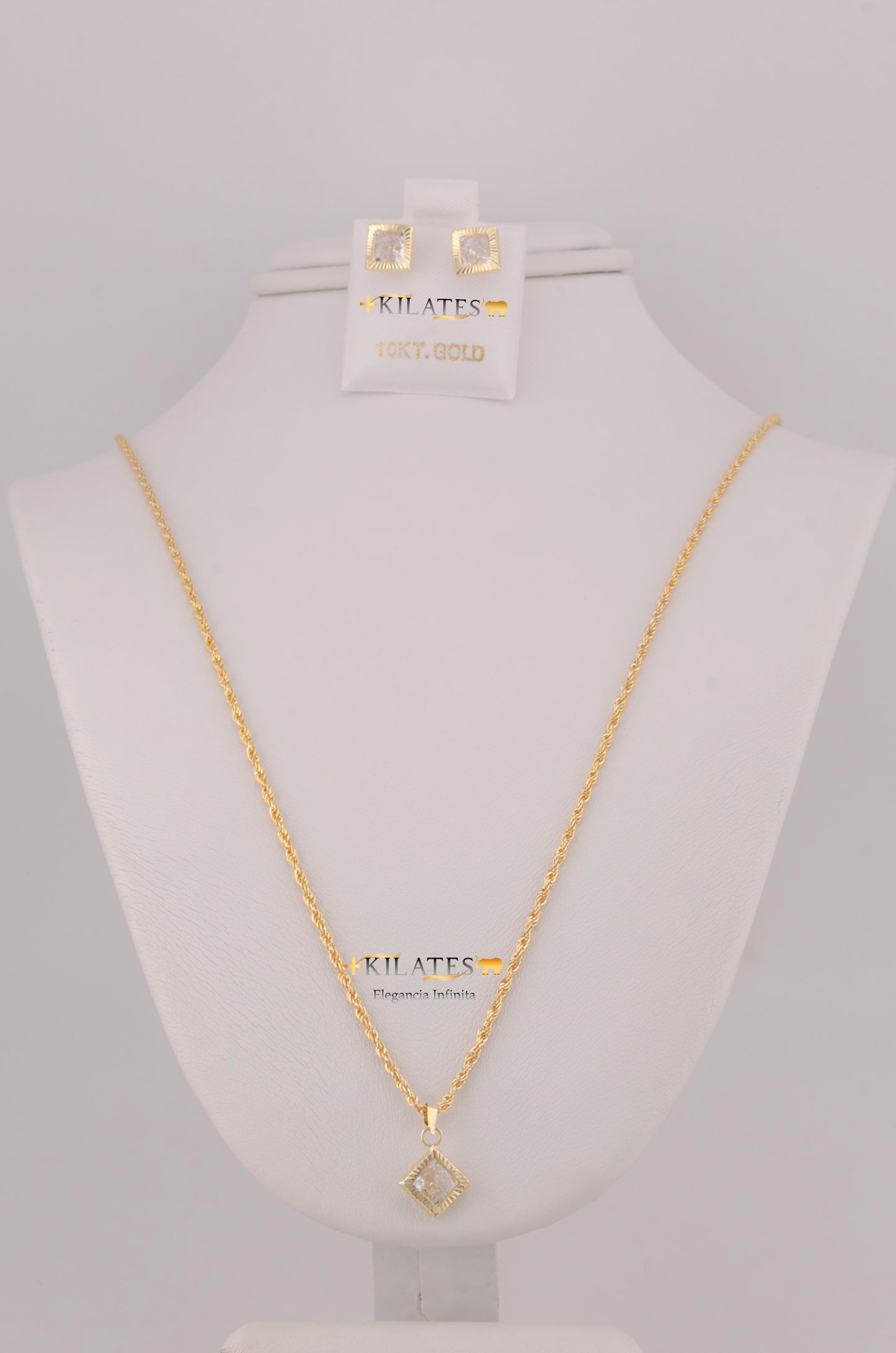 "SET DE CADENA ESTILO LAZO DE 50CM PARA DAMA CON DIJE Y ARETES DE CUADRADO CON ZIRCONIA BLANCA. ORO 10K #775-3800"