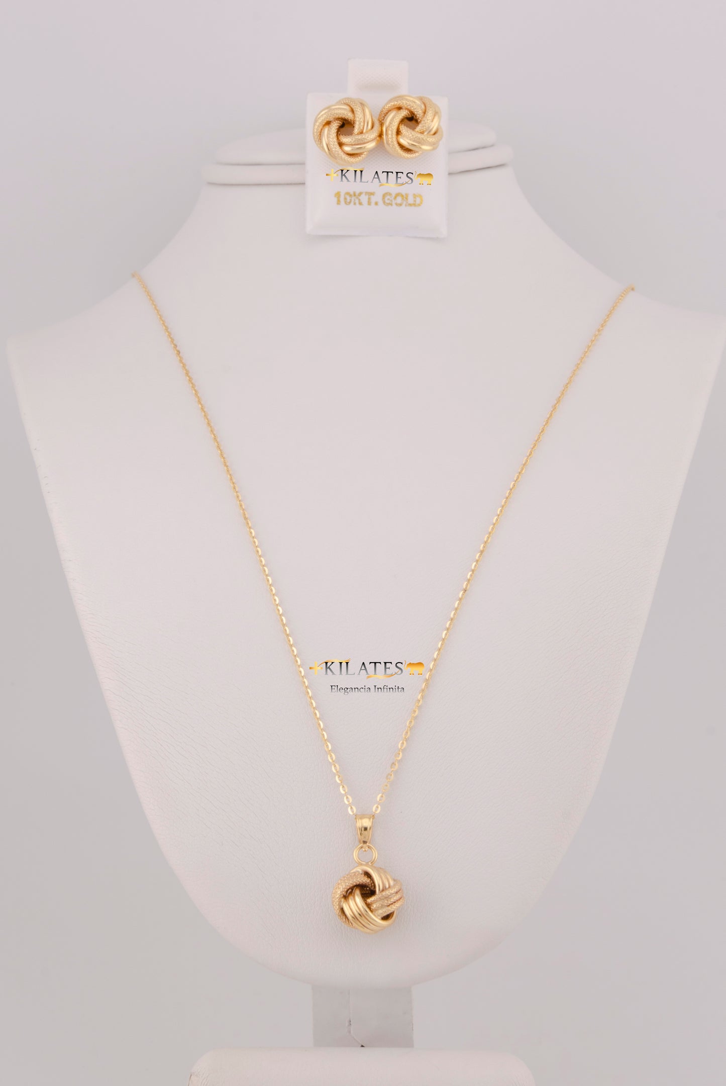 "SET DE CADENA ESTILO CUADRADA SOLIDA DE 50CM PARA DAMA CON DIJE Y ARETES DE NUDO. ORO 10K #775-3809"