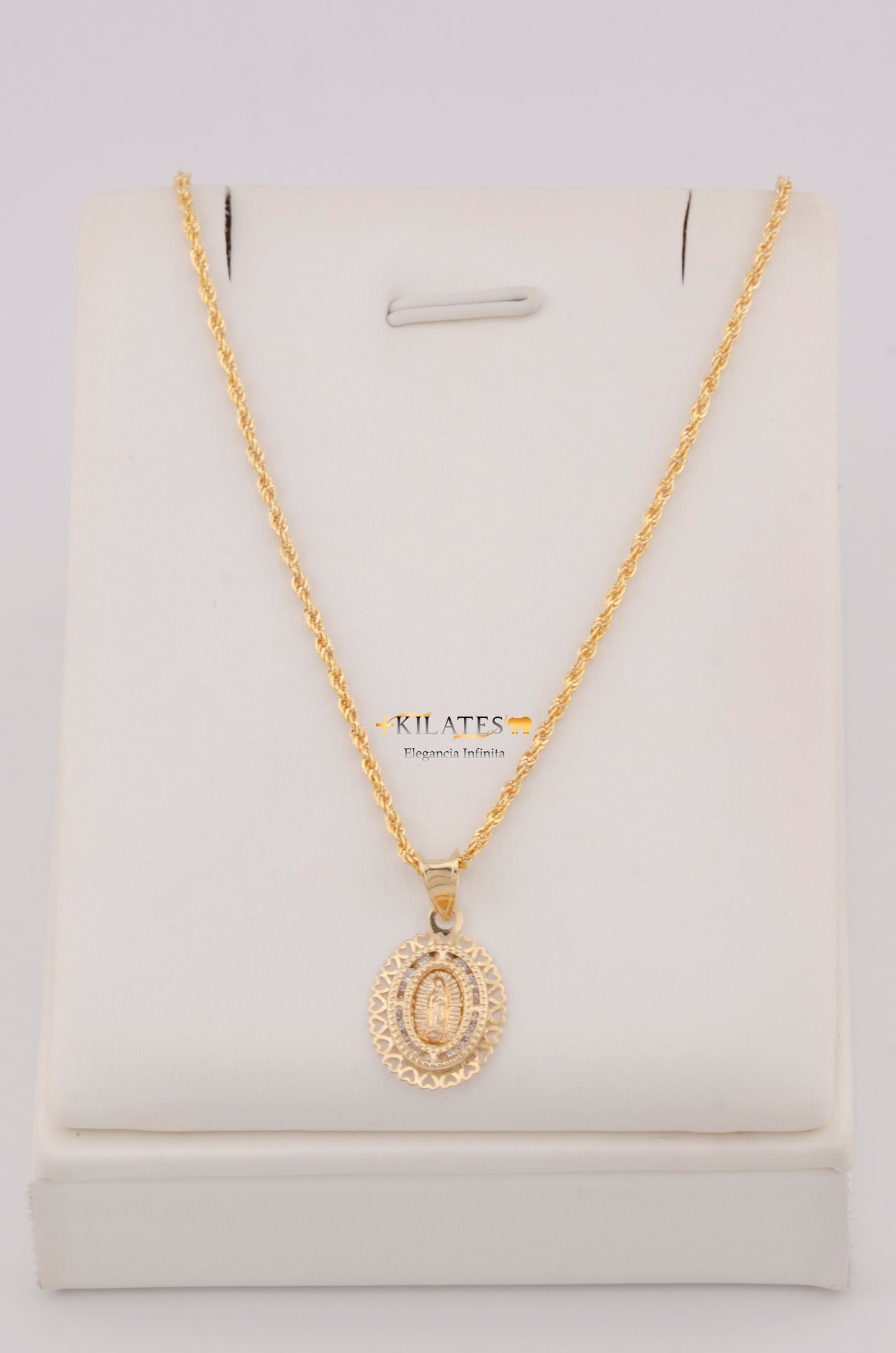 "SET DE CADENA ESTILO LAZO DE 50CM PARA DAMA CON DIJE Y ARETES DE CORAZON CON ZIRCONIA BLANCA. ORO 10K #775-3799"