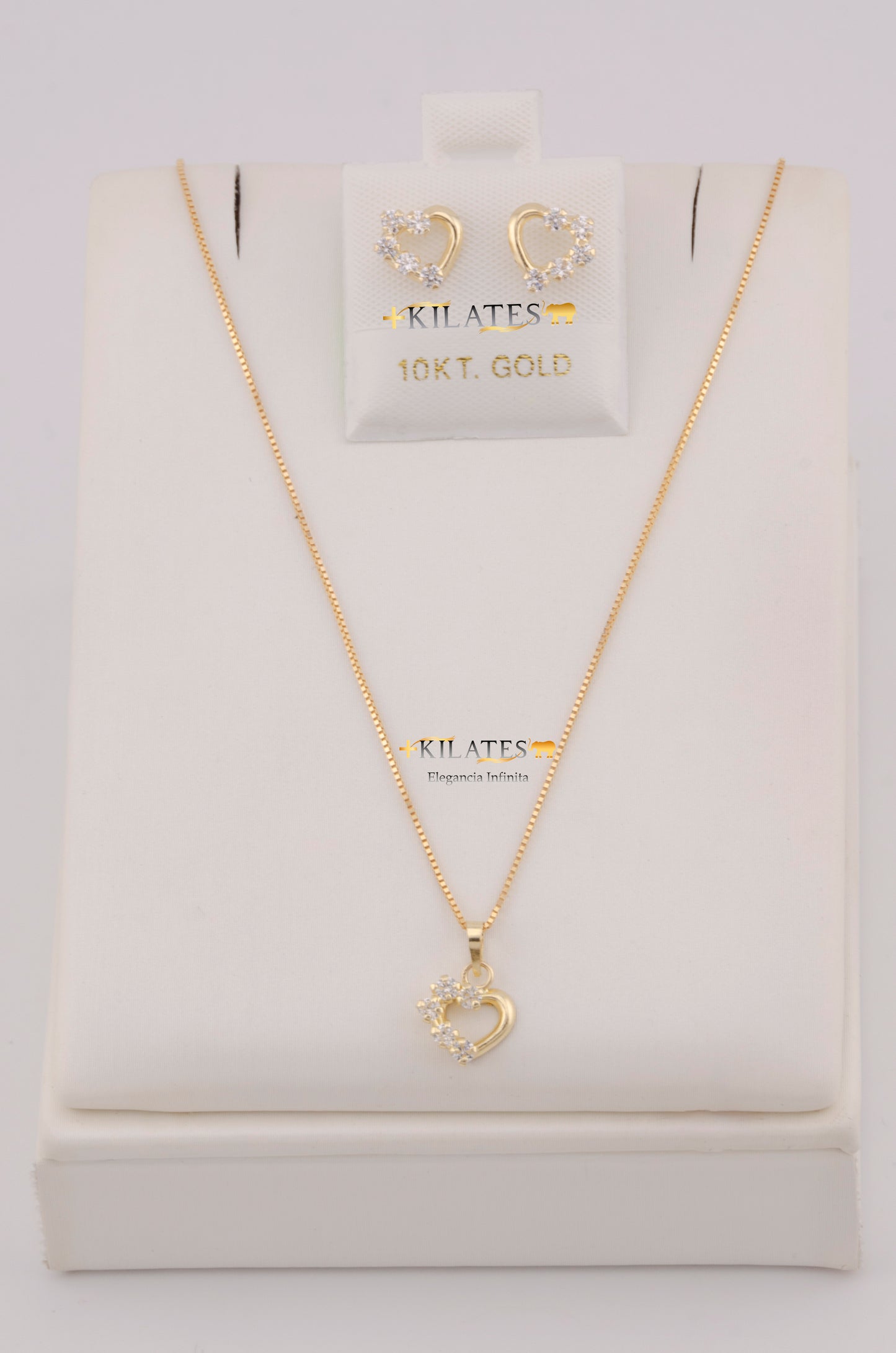 "SET DE CADENA ESTILO FINITA DE 50CM PARA DAMA CON DIJE Y ARETES DE CORAZON CON ZIRCONIA BLANCA. ORO 10K #775-3806"
