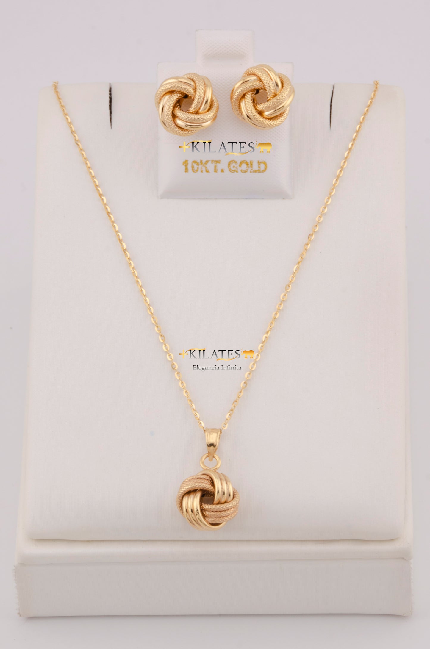 "SET DE CADENA ESTILO CUADRADA SOLIDA DE 50CM PARA DAMA CON DIJE Y ARETES DE NUDO. ORO 10K #775-3809"