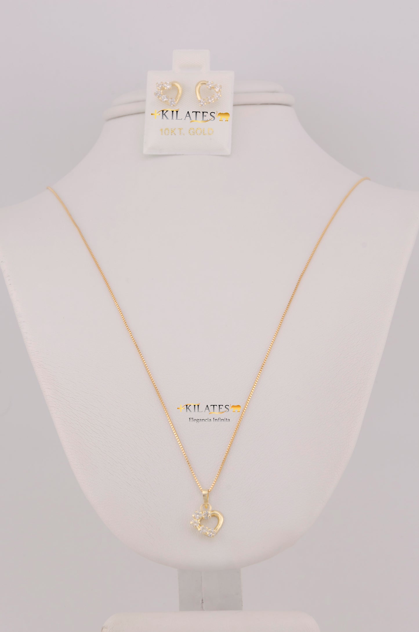 "SET DE CADENA ESTILO FINITA DE 50CM PARA DAMA CON DIJE Y ARETES DE CORAZON CON ZIRCONIA BLANCA. ORO 10K #775-3806"