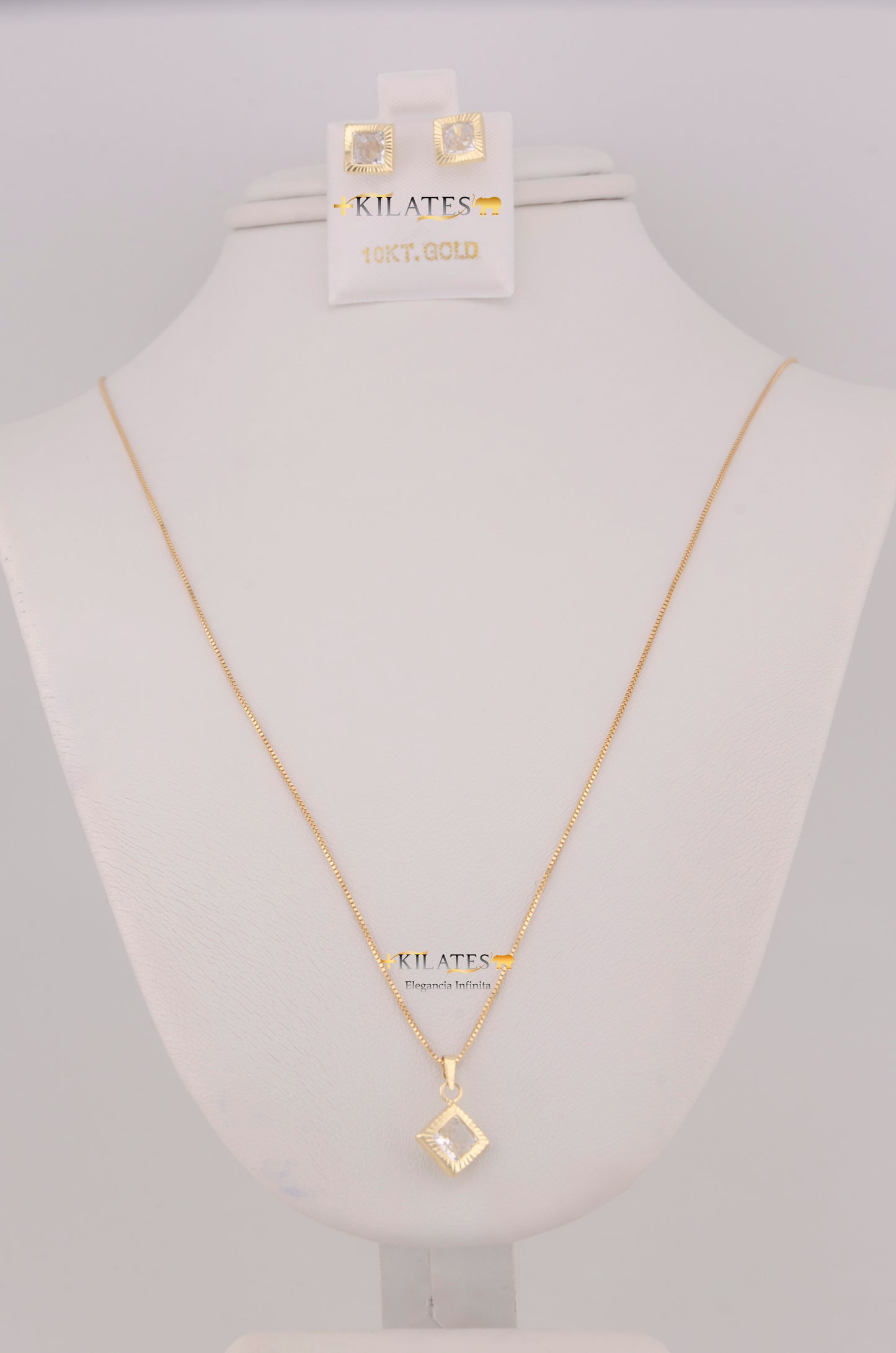 "SET DE CADENA ESTILO FINITA DE 50CM PARA DAMA CON DIJE Y ARETES DE CUADRADO CON ZIRCONIA BLANCA. ORO 10K #775-3807"