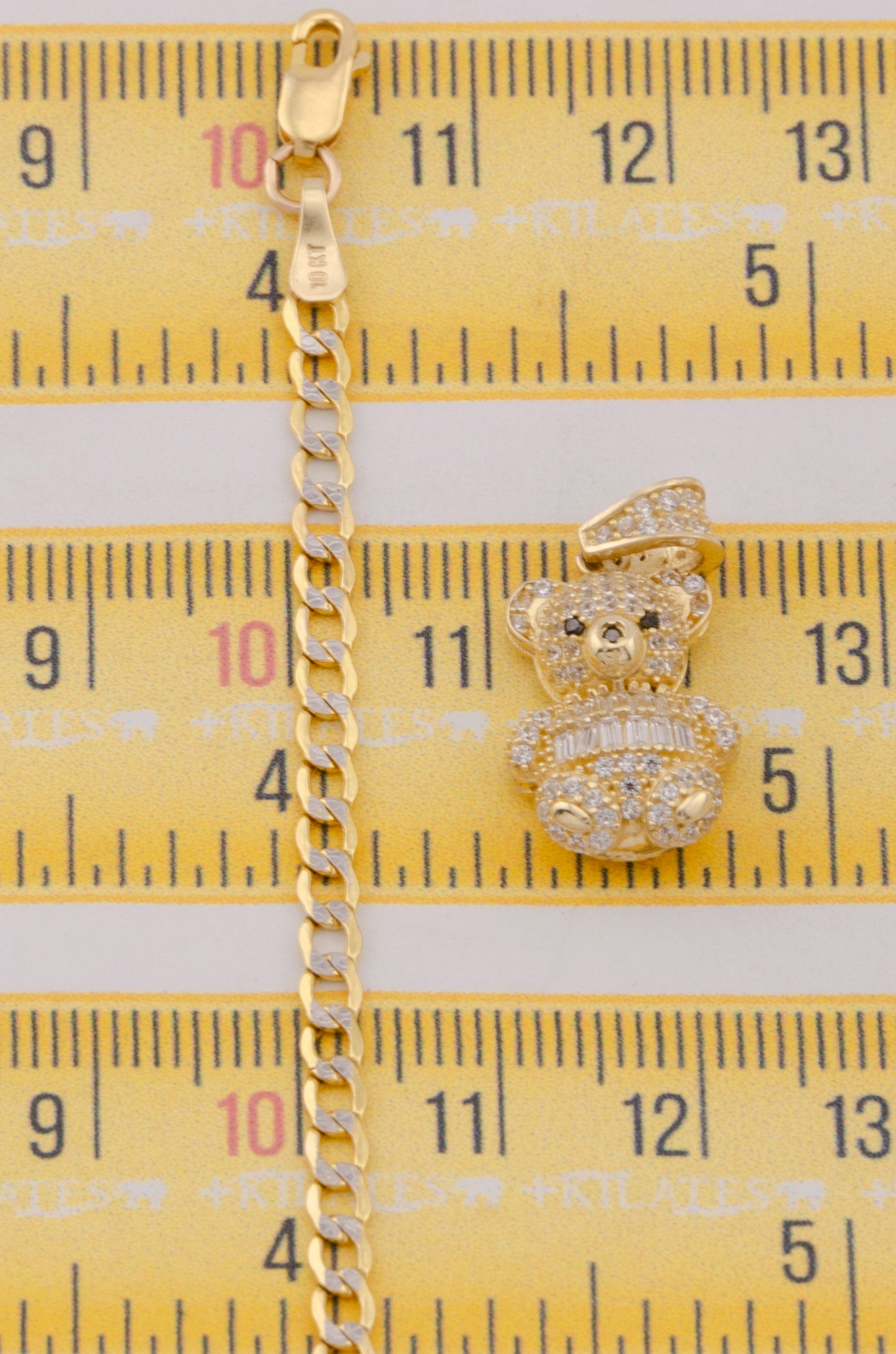 "CADENA PARA DAMA ESTILO CUBANA DIAMANTADA CON DIJE DE OSO. ORO 10K #775-3795"