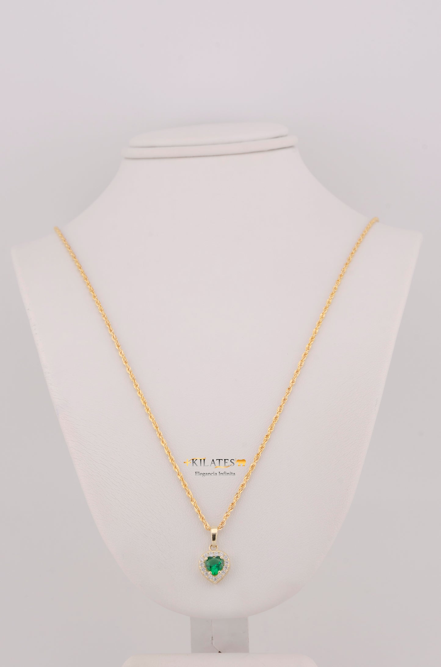 "CADENA DE 50CM PARA DAMA ESTILO LAZO CON DIJE DE CORAZON BLANCO CON VERDE. ORO 10K #775-3828"