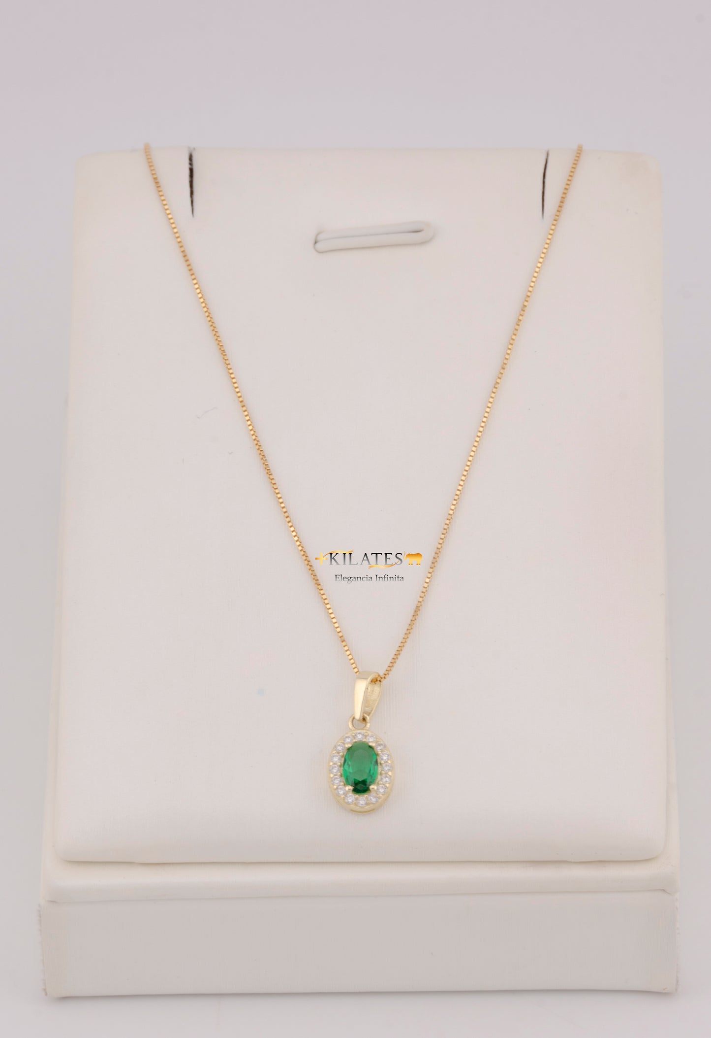 "CADENA DE 50CM PARA DAMA ESTILO FINITA CON DIJE OVALADO BLANCO CON VERDE. ORO 10K #775-3842"