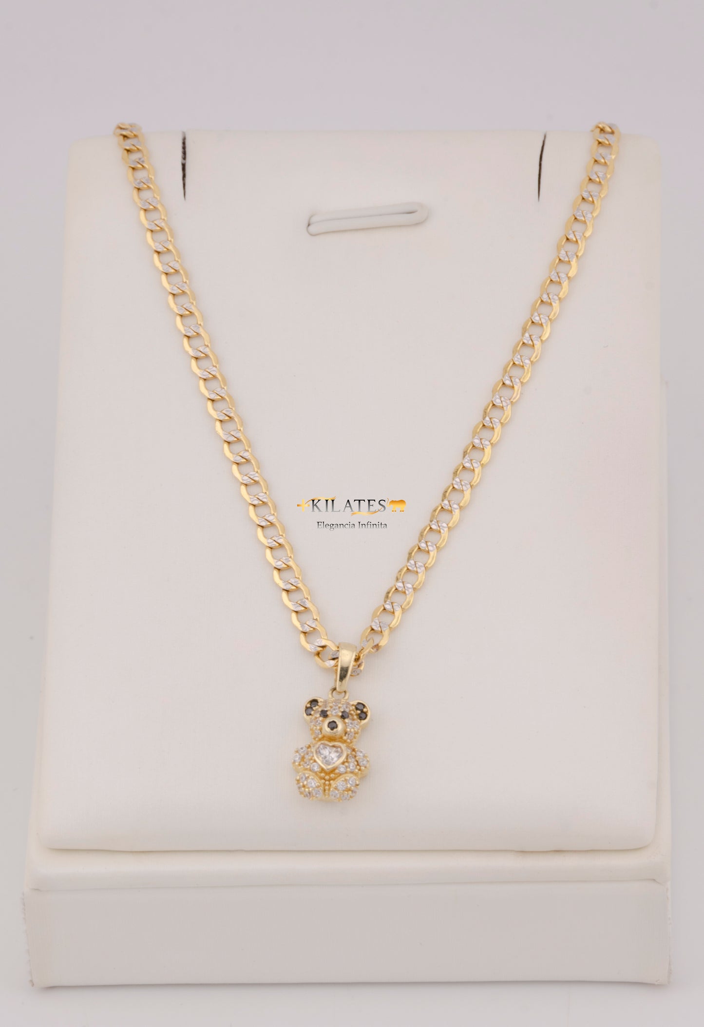 "CADENA DE 50CM PARA DAMA ESTILO CUBANA DIAMANTADA CON DIJE DE OSO PEQUEÑO. ORO 10K #775-3820"