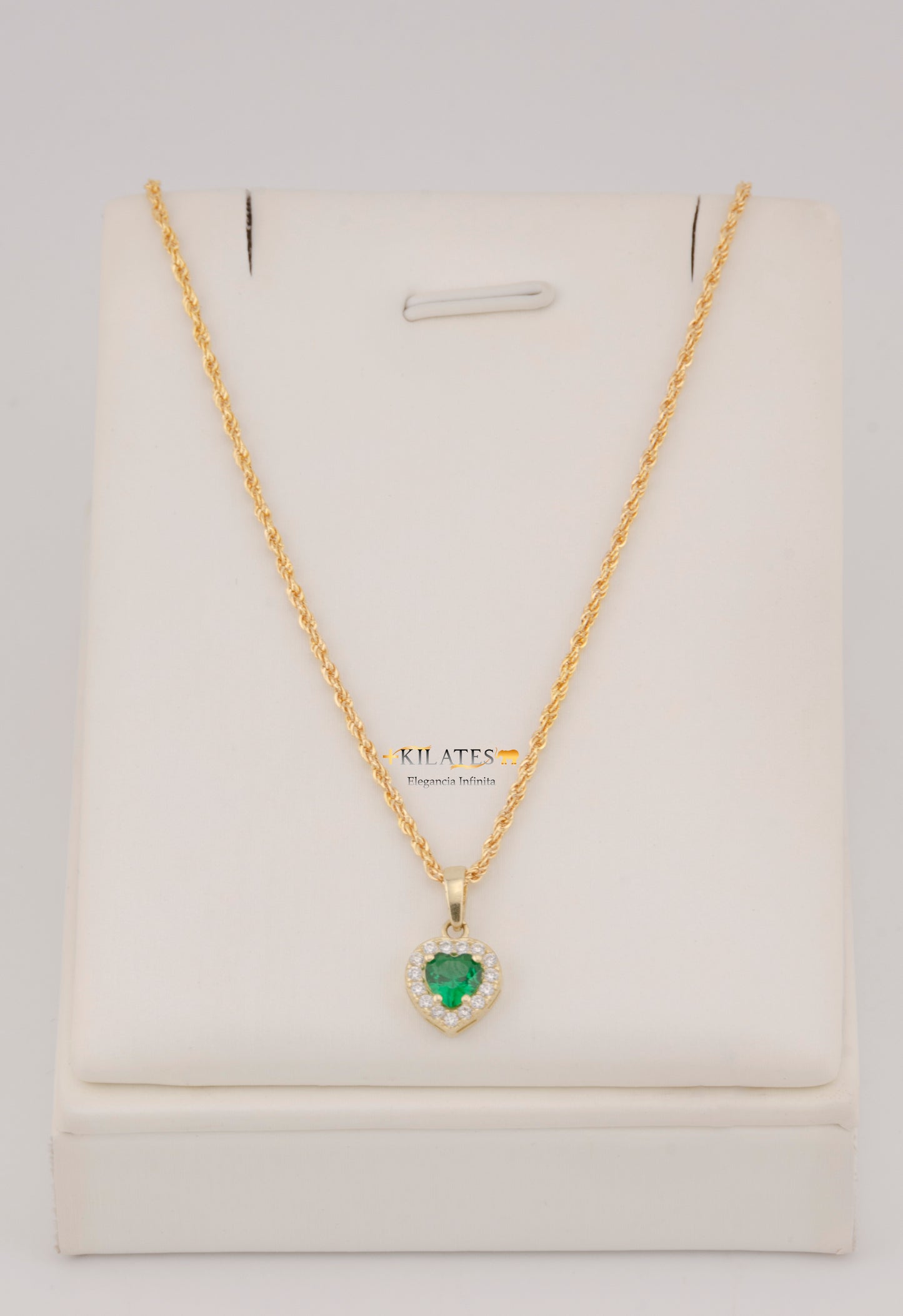 "CADENA DE 50CM PARA DAMA ESTILO LAZO CON DIJE DE CORAZON BLANCO CON VERDE. ORO 10K #775-3828"