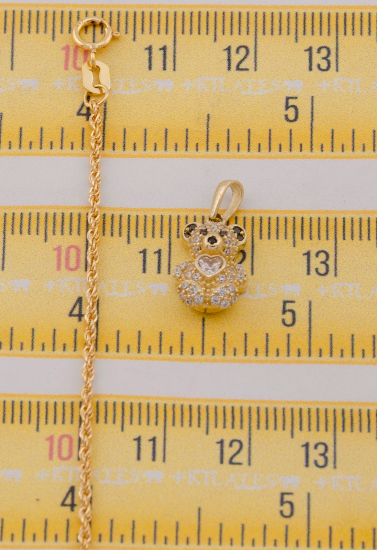 "CADENA DE 50CM PARA DAMA ESTILO LAZO CON DIJE DE OSO PEQUEÑO. ORO 10K #775-3819"