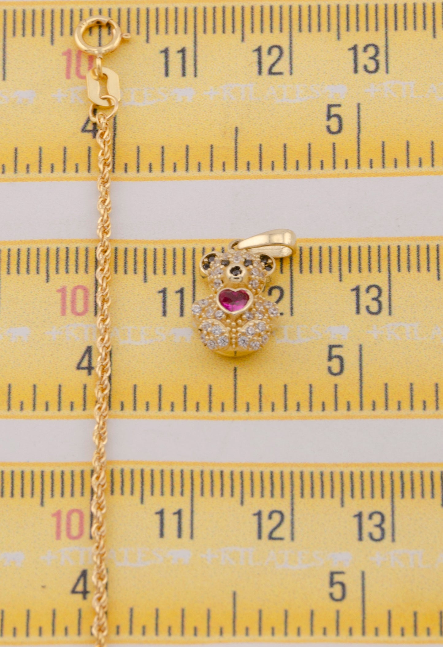 "CADENA DE 50CM PARA DAMA ESTILO LAZO CON DIJE DE OSO PEQUEÑO. ORO 10K #775-3823"