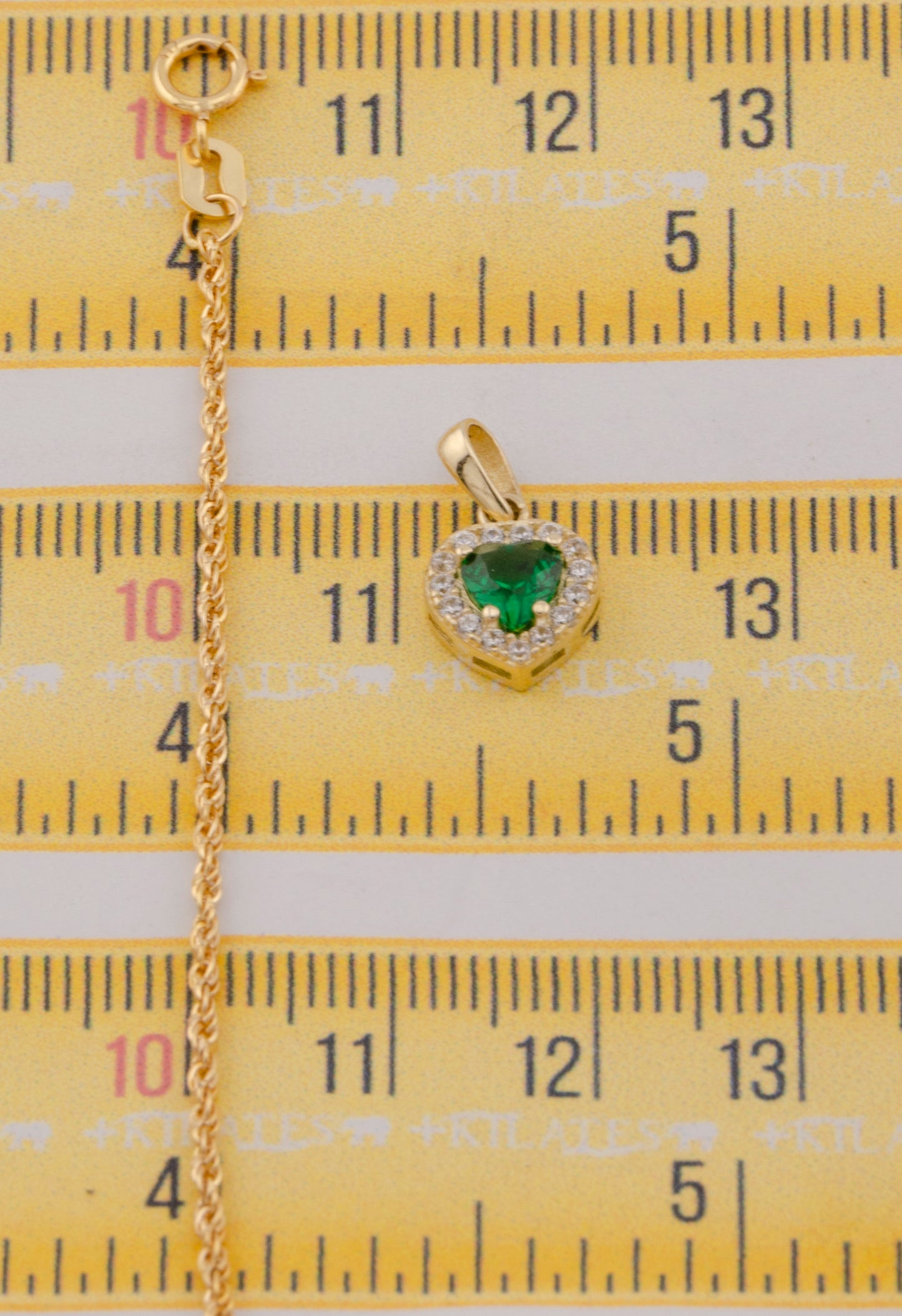"CADENA DE 50CM PARA DAMA ESTILO LAZO CON DIJE DE CORAZON BLANCO CON VERDE. ORO 10K #775-3828"