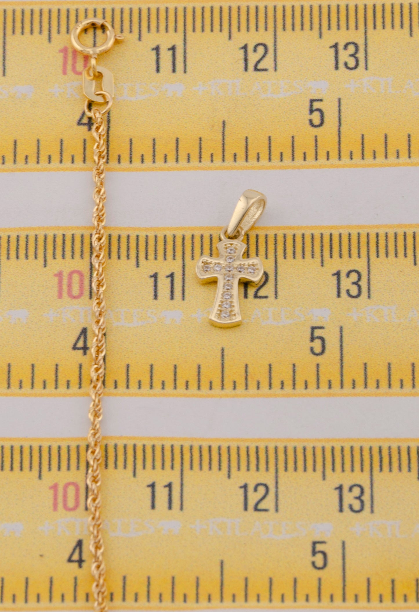 "CADENA DE 50CM PARA DAMA ESTILO LAZO CON DIJE DE CRUZ CON ZIRCONIA BLANCA. ORO 10K #775-3848"