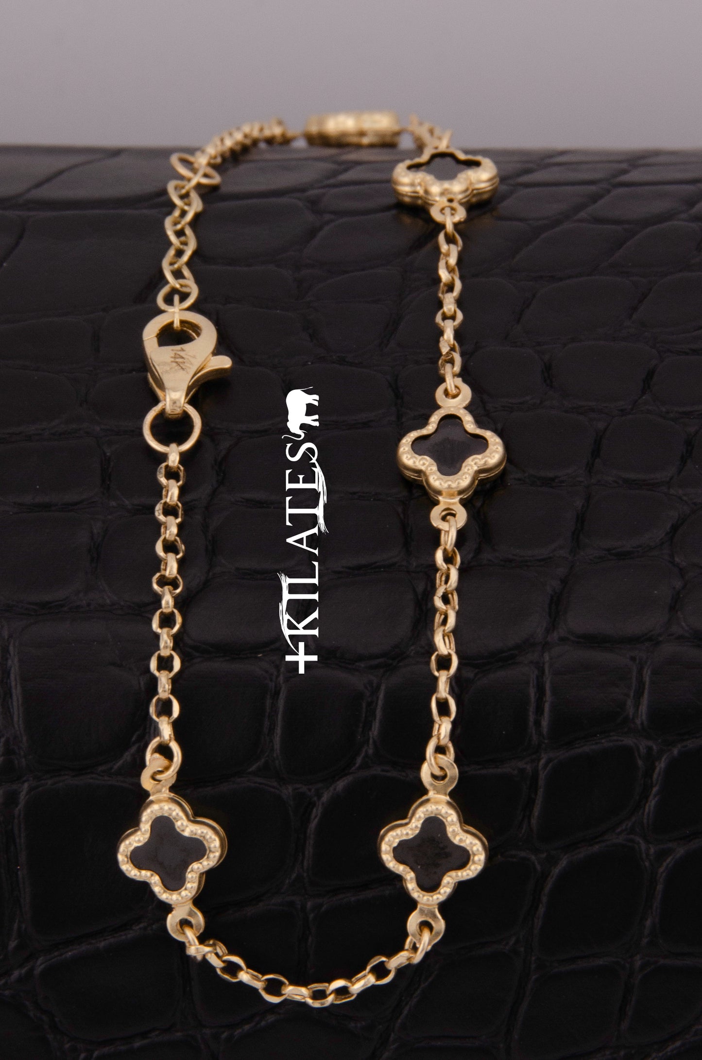 "PULSERA PARA DAMA AJUSTABLE DE 17.6CM-19.5CM CON TREBOLES. ORO 14K #775-3854"