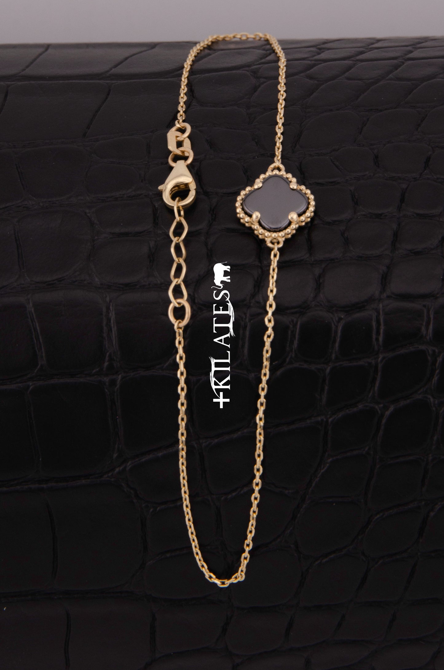 "PULSERA PARA DAMA AJUSTABLE DE 17.6CM-19.5CM CON TREBOL. ORO 14K #775-3855"