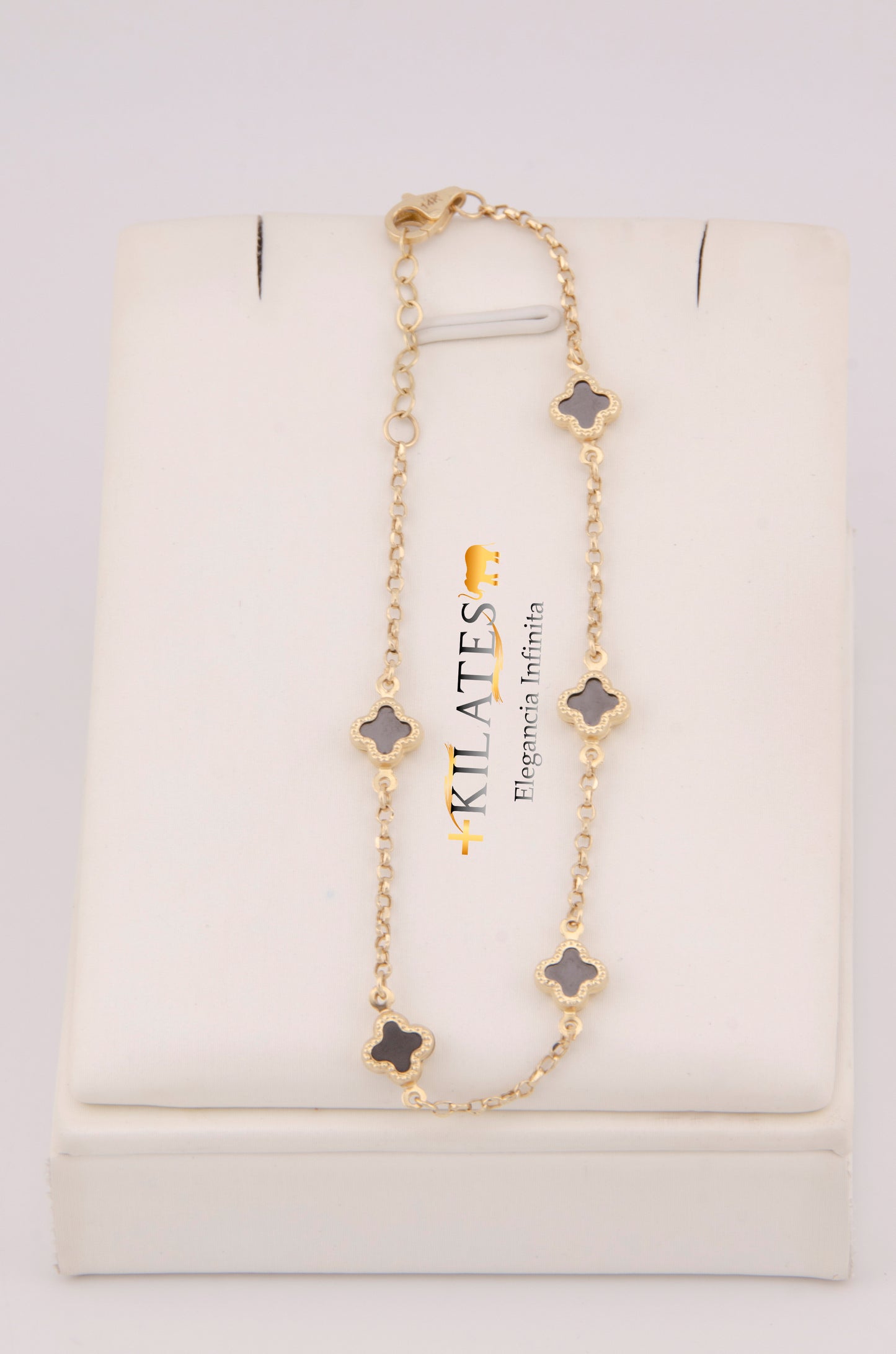 "PULSERA PARA DAMA AJUSTABLE DE 17.6CM-19.5CM CON TREBOLES. ORO 14K #775-3854"