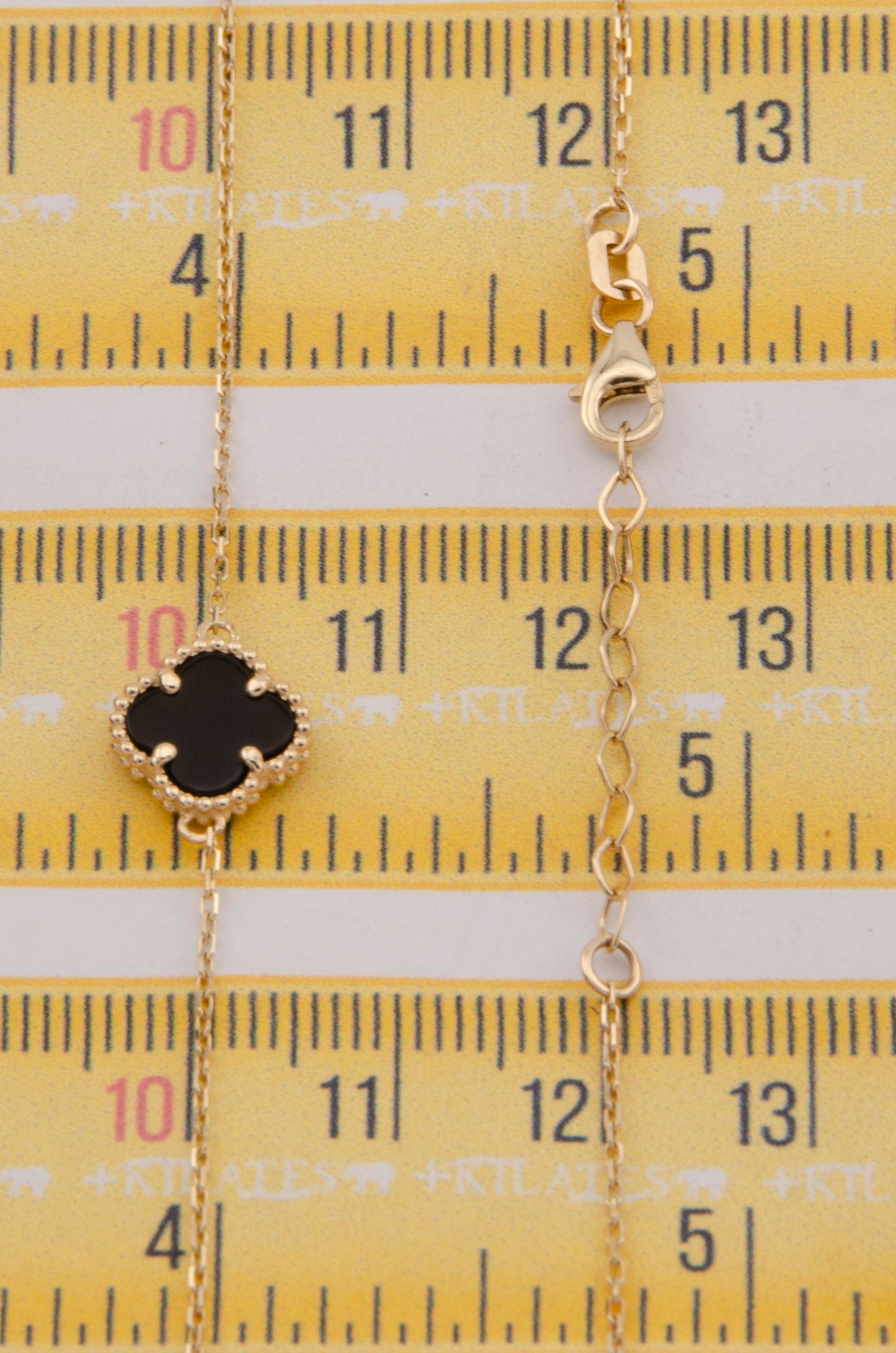 "PULSERA PARA DAMA AJUSTABLE DE 17.6CM-19.5CM CON TREBOL. ORO 14K #775-3855"