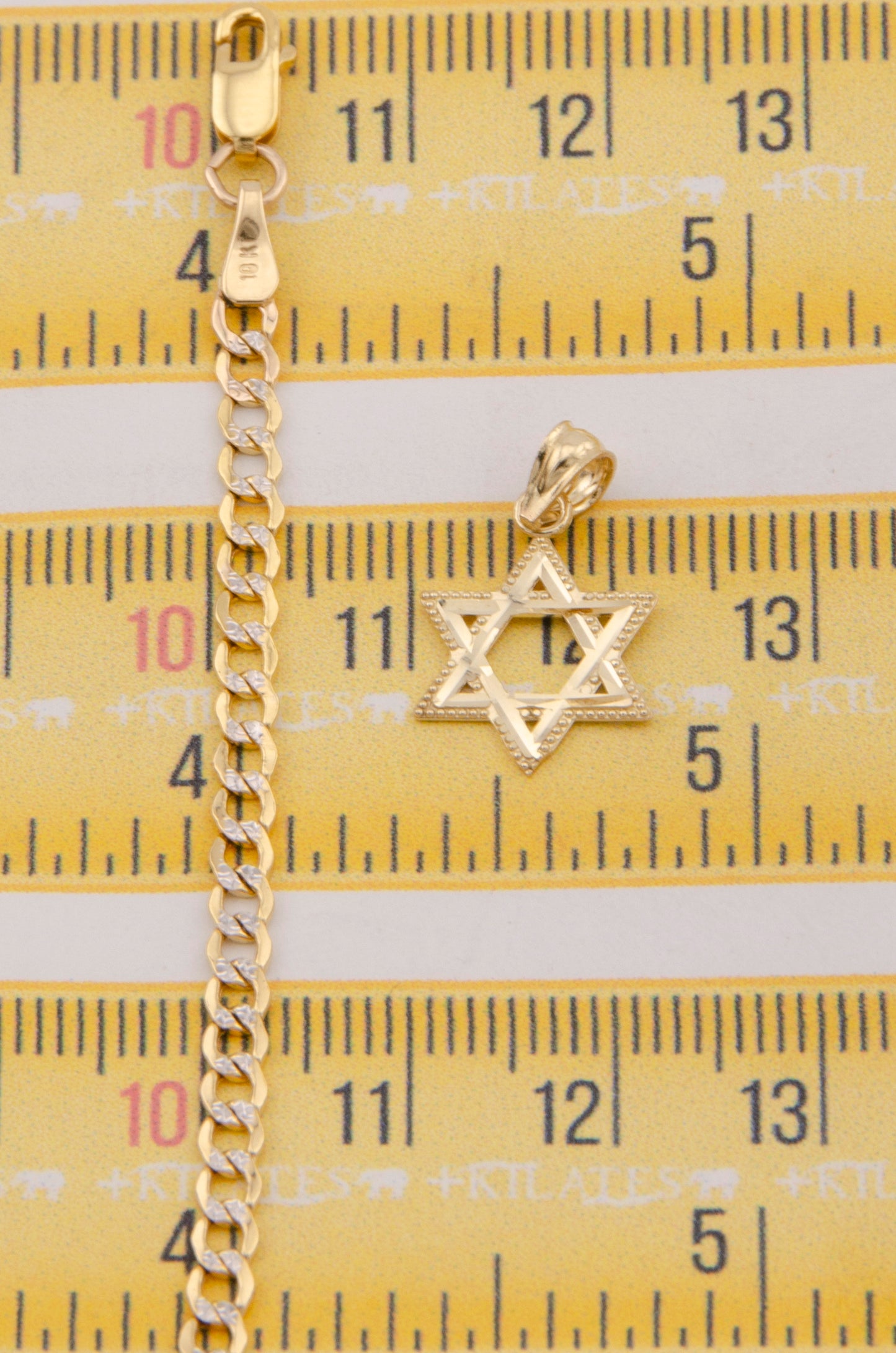 "CADENA PARA NIÑ@ DE 40CM ESTILO CUBANA DIAMANTADA CON DIJE DE ESTRELLA. ORO 10K #775-3865"