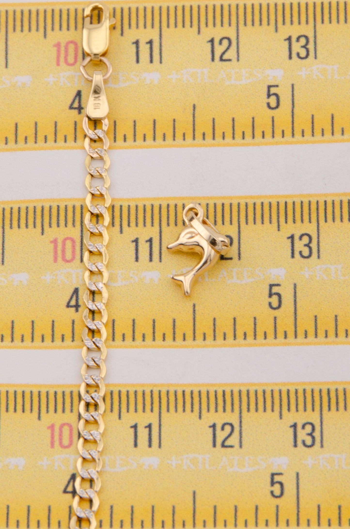 CADENA PARA NIÑ@ DE 40CM ESTILO CUBANA DIAMANTADA CON DIJE DE DELFIN PEQUEÑO. ORO 10K #775-3866