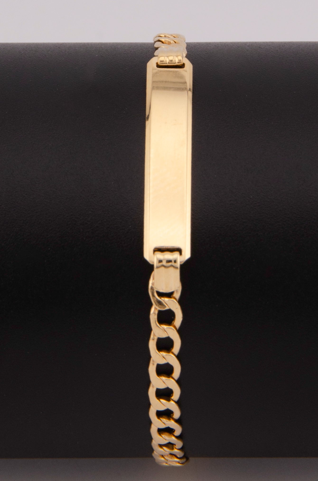 "PULSERA PARA NIÑO DE 14.5CM ESTILO CUBANA CON PLACA. ORO 10K #775-3883"