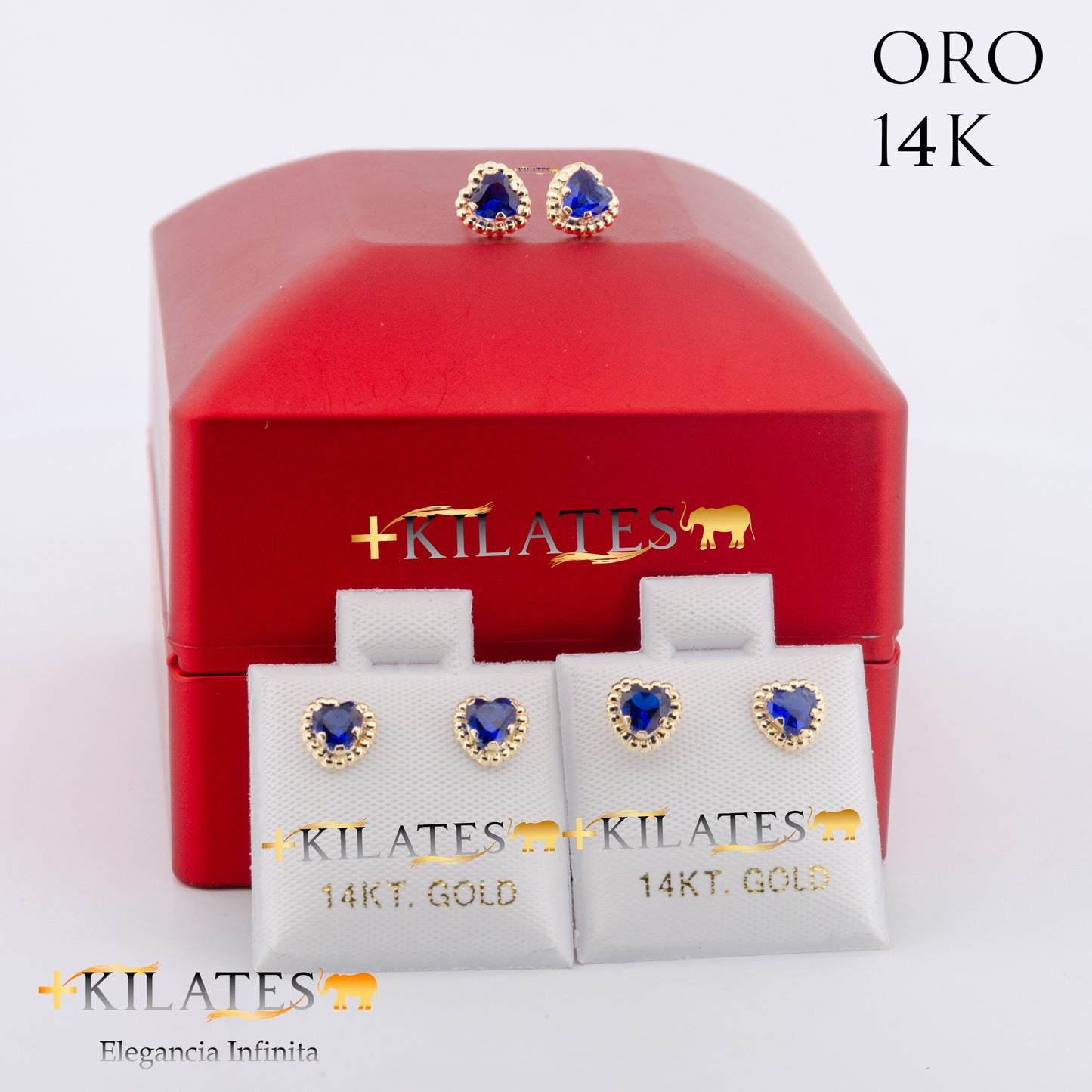 "ARETES PREMIUM CORAZON CON ZIRCONIA AZUL . ORO 14K #775-1570"