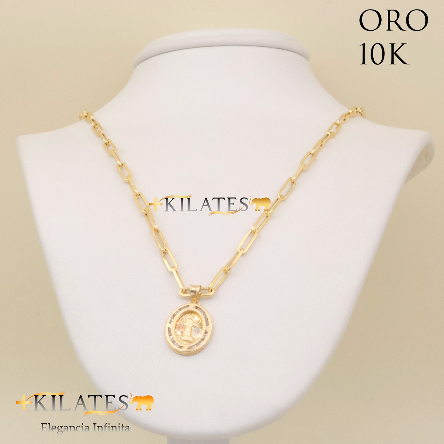 "CADENA ESTILO CLIP CON DIJE DE DIVINO NIÑO. ORO 10K #775-1748"