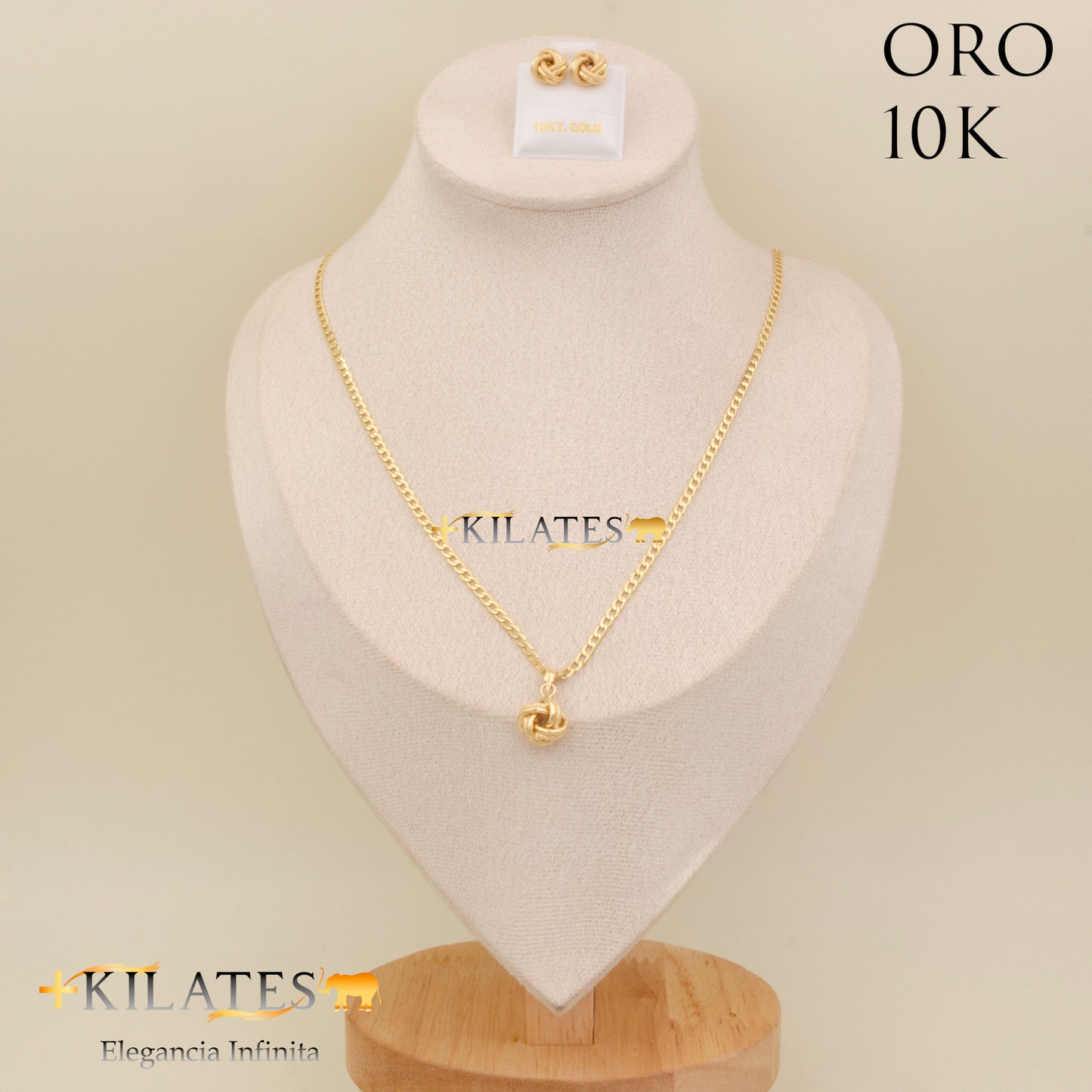 "SET ARETES CON CADENA ESTILO CUBANA Y DIJE DE NUDO, 50 CM  . ORO 10K #775-2067"