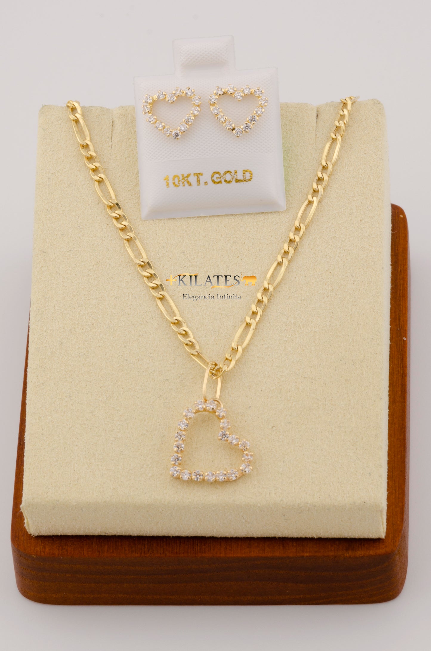 "SET PARA MUJER CADENA ESTILO 3+1  CON DIJE DE CORAZON Y ARETES. ORO 10K #775-2429"