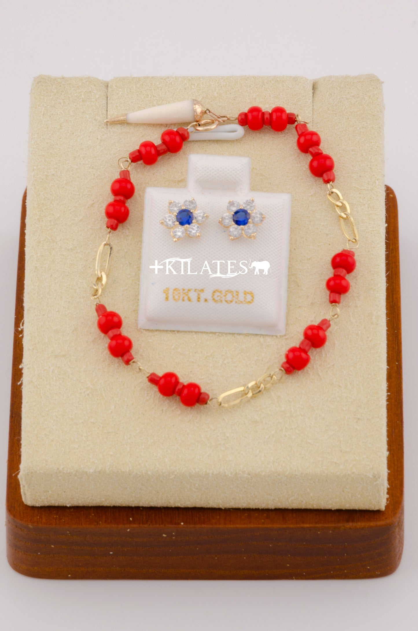 "SET PARA NIÑ@ DE PULSERA CON ARETES PREMIUM DE FLOR  CON ZIRCONIA AZUL. ORO 10K #775-2583"