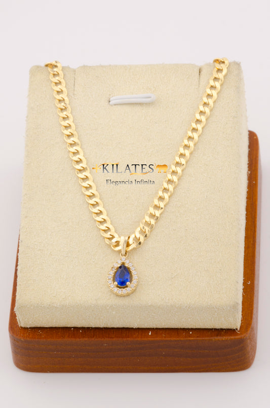 "CADENA DE 50 CM PARA ADULTO ESTILO CUBANA CON DIJE DE GOTA CON ZIRCONIA AZUL. ORO 10K.  #775-2706"