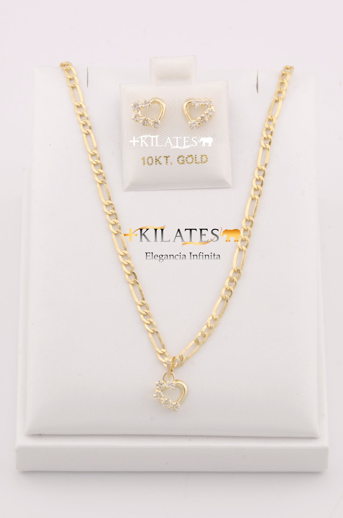 "SET PARA MUJER DE CADENA DE 50CM ESTILO 3+1 CON DIJE DE LA CORAZON CON ZIRCONIA BLANCA Y ARETES. ORO 10K #775-2829"