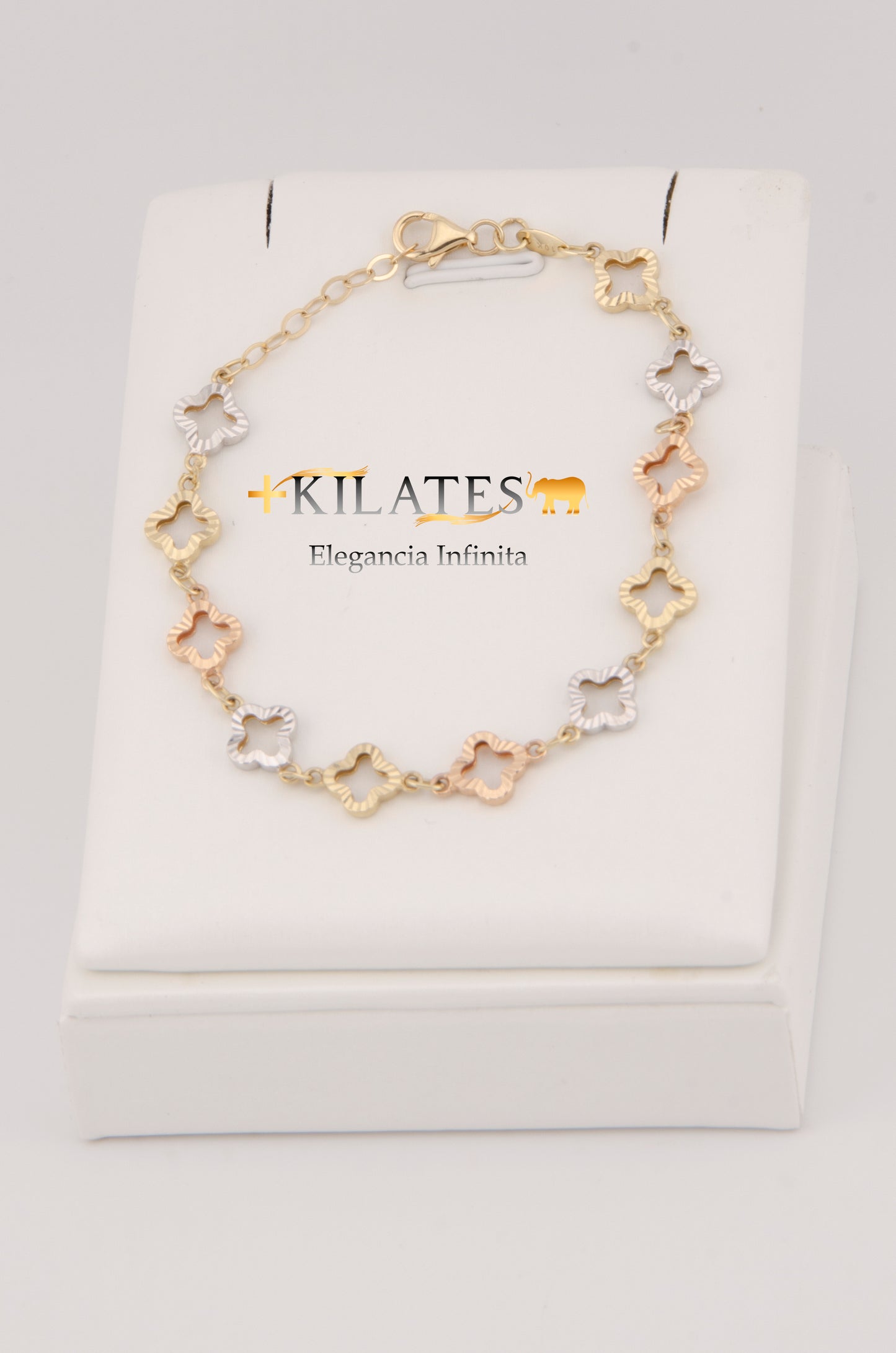 "PULSERA AJUSTABLE DE TREBOLES 3 TONOS DE 19CM-17CM PARA ADULTO . ORO 10K #775-2855"