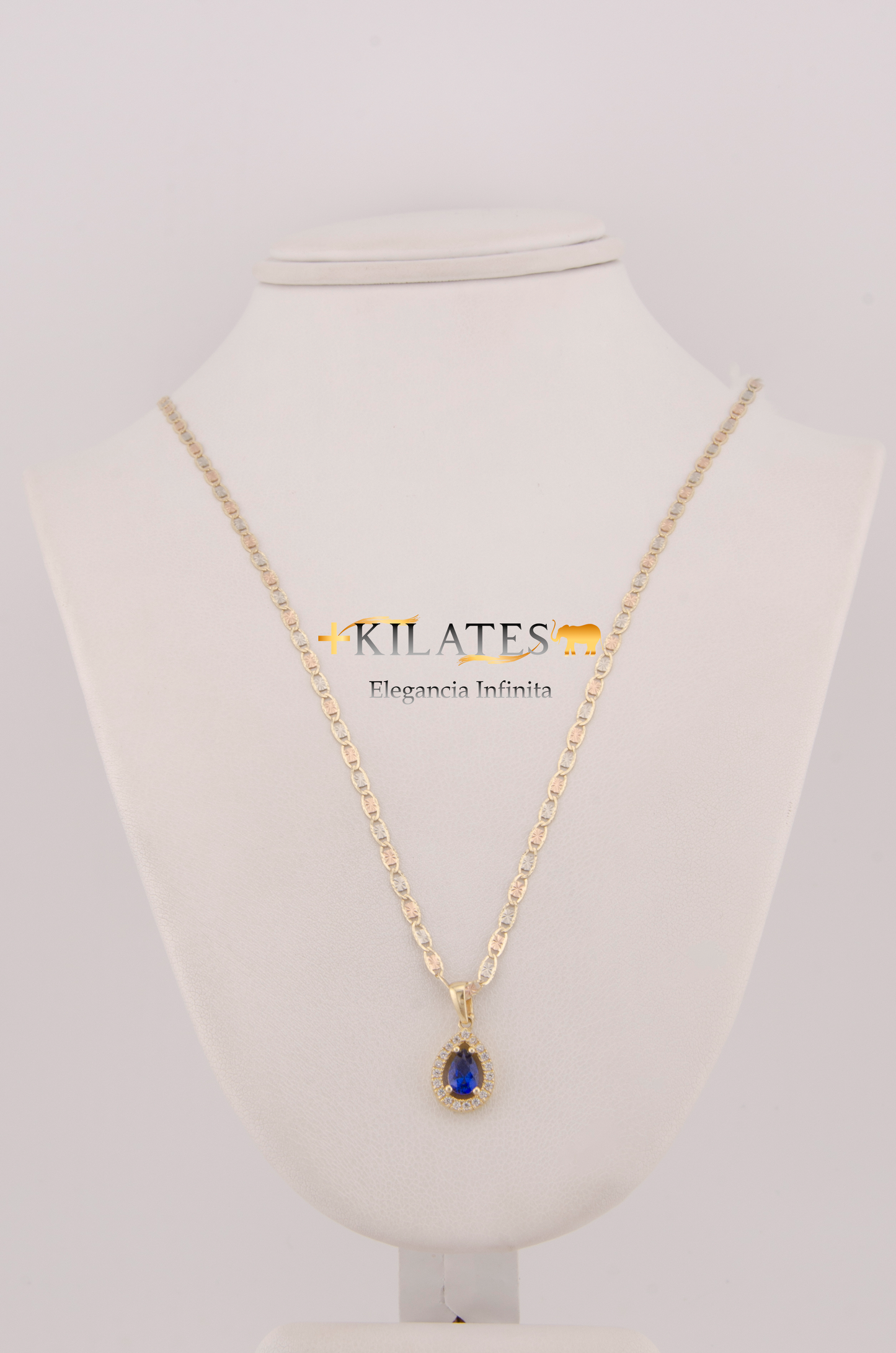 "CADENA DE 50CM PARA ADULTO ESTILO 3 OROS CON DIJE DE PLACA DE GOTA CON ZIRCONIA AZUL.ORO 10K #775-2898"