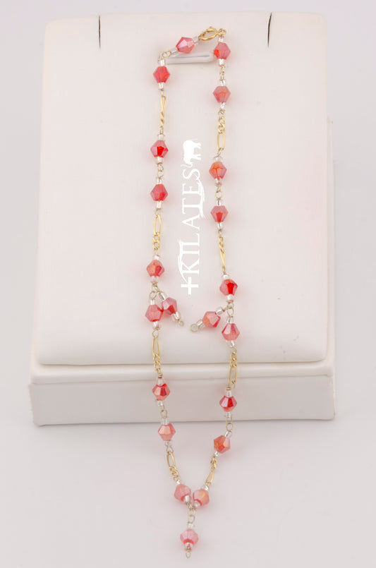 "TOBILLERA PARA ADULTO DE 26CM CON CRISTALES SWAROSKY ROJOS. ORO 10K #775-3338"