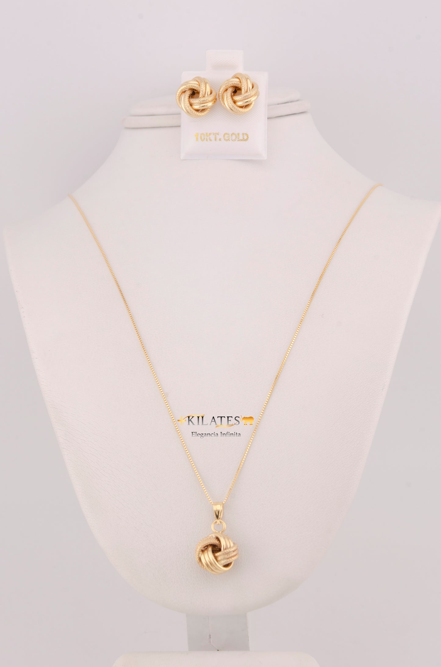 "SET DE CADENA DE 50CM ESTILO FINITA CON DIJE Y ARETES DE NUDO. ORO 10K #775-3750"