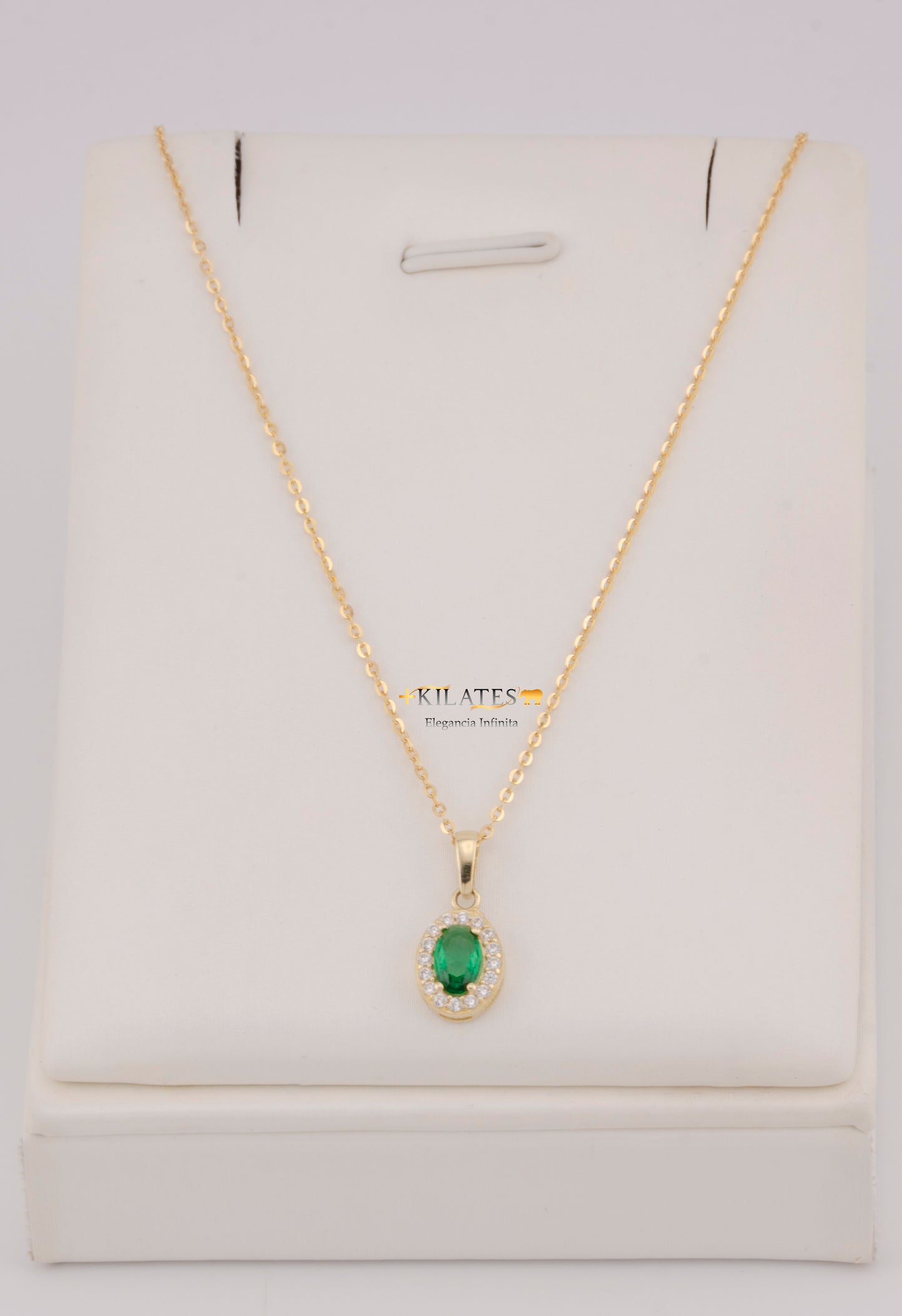 "CADENA DE 50CM PARA DAMA ESTILO CUADRADA SOLIDA CON DIJE OVALADO BLANCO CON VERDE. ORO 10K #775-3841"