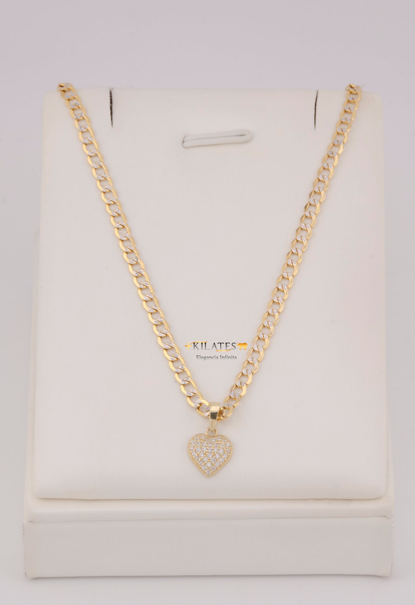 "CADENA DE 50CM PARA DAMA ESTILO CUBANA DIAMANTADA CON DIJE DE CORAZON CON ZIRCONIA BLANCA. ORO 10K #775-3840"