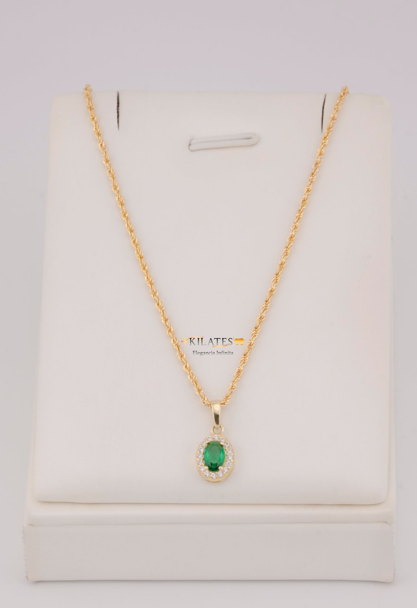 "CADENA DE 50CM PARA DAMA ESTILO LAZO CON DIJE OVALADO BLANCO CON VERDE. ORO 10K #775-3843"