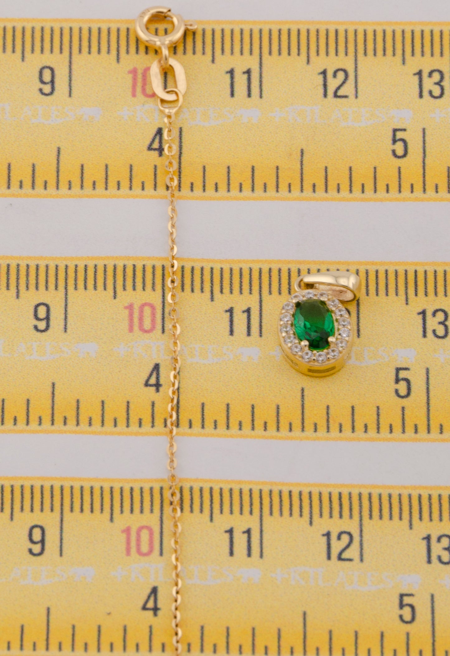 "CADENA DE 50CM PARA DAMA ESTILO CUADRADA SOLIDA CON DIJE OVALADO BLANCO CON VERDE. ORO 10K #775-3841"