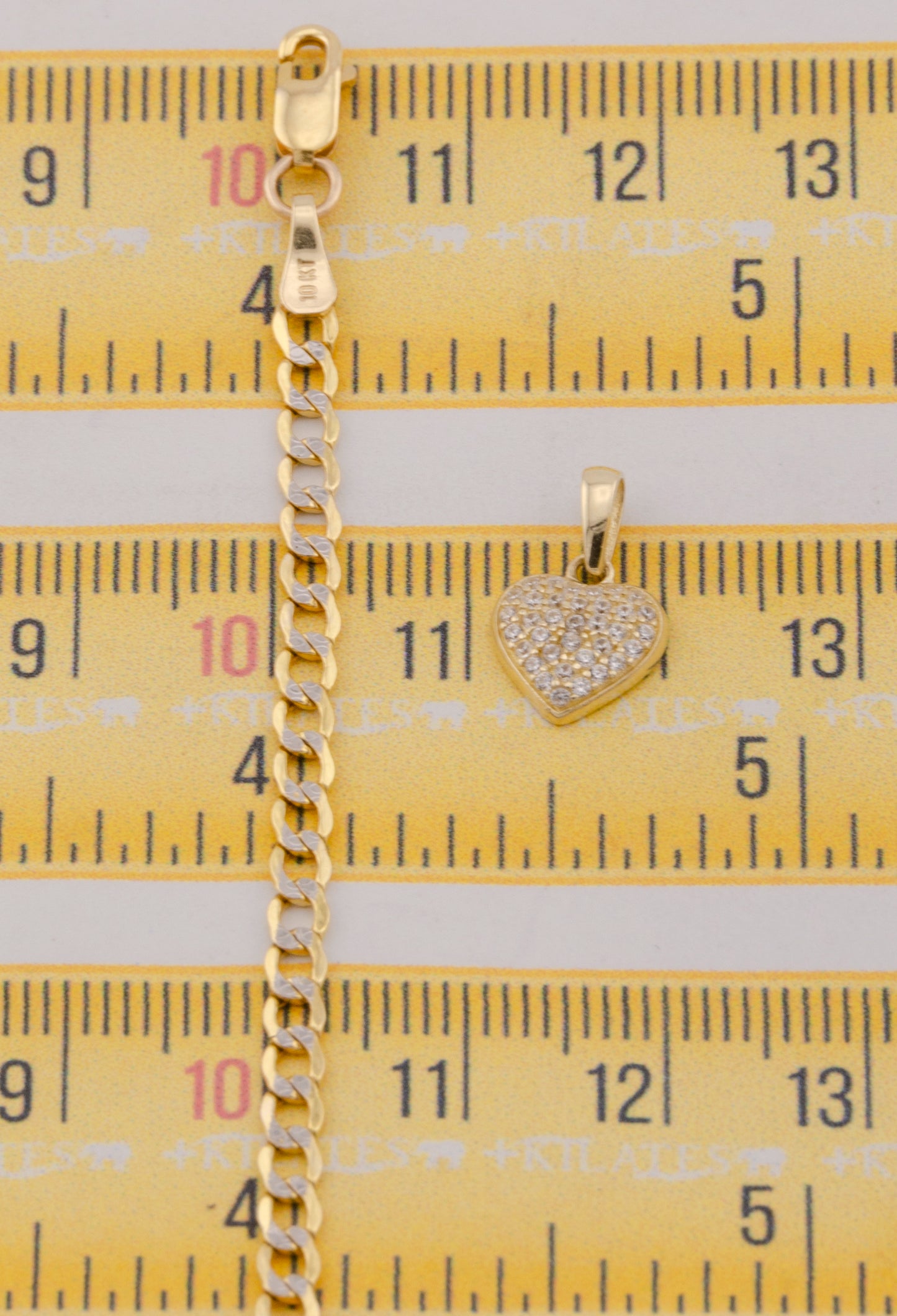 "CADENA DE 50CM PARA DAMA ESTILO CUBANA DIAMANTADA CON DIJE DE CORAZON CON ZIRCONIA BLANCA. ORO 10K #775-3840"