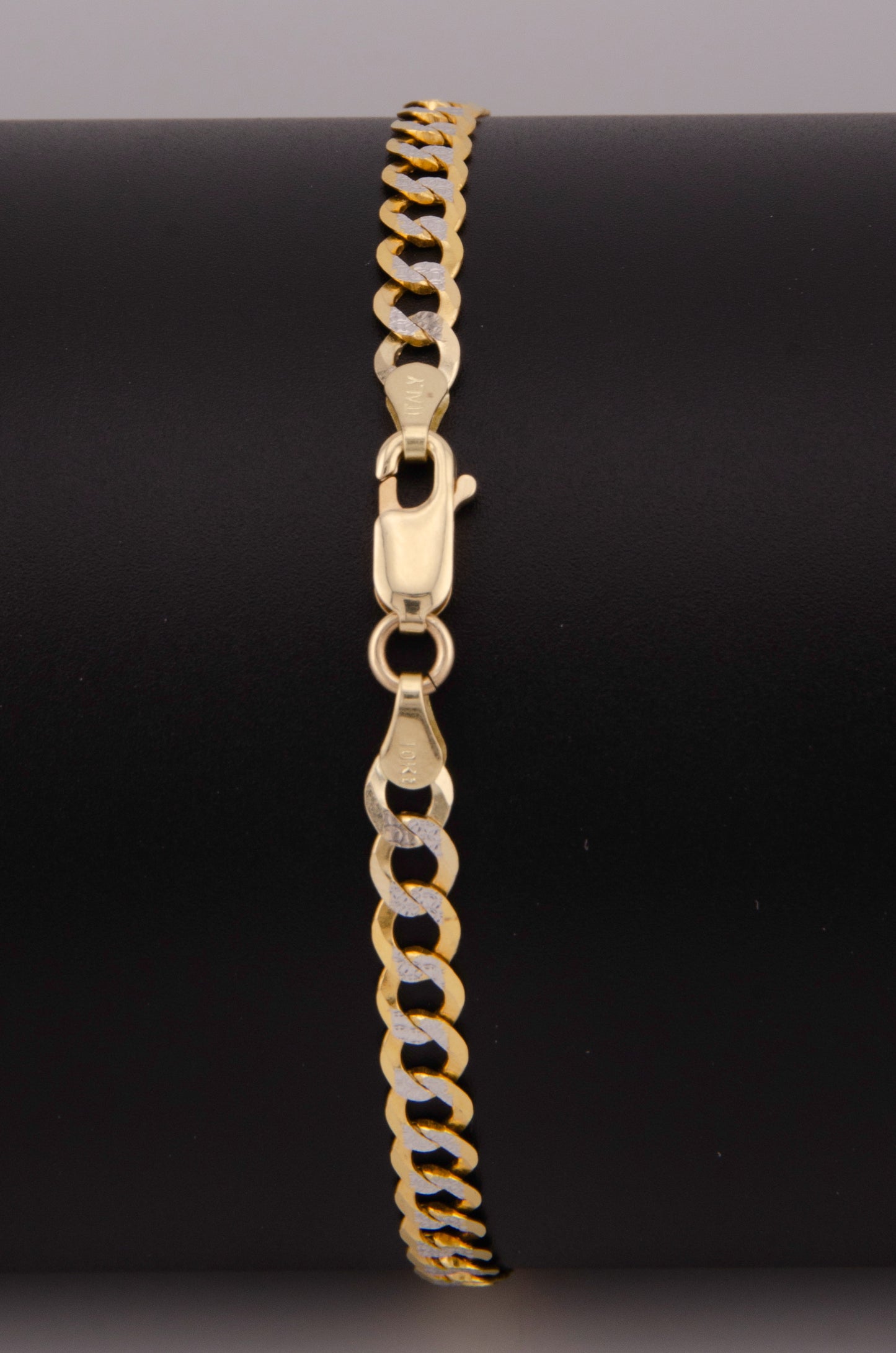 "PULSERA PARA ADULTO DE 21 CM ESTILO CUBANA DIAMANTADA SOLIDA. ORO 10K #775-3853"