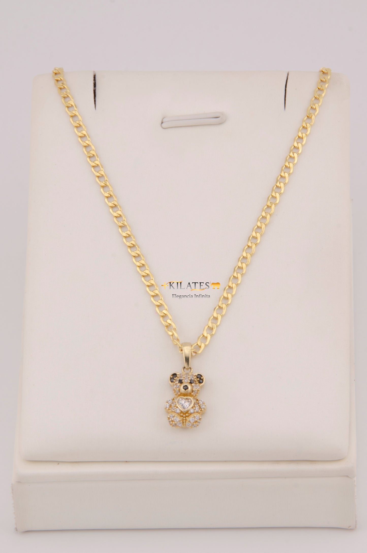 "CADENA DE 50CM PARA DAMA ESTILO  CUBANA CON DIJE DE OSO PEQUEÑO. ORO 10K #775-3911"
